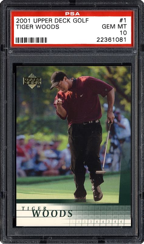 This image shows a victorious <b>Woods</b> after sinking his putt on the 18th and final hole. . 2001 upper deck tiger woods